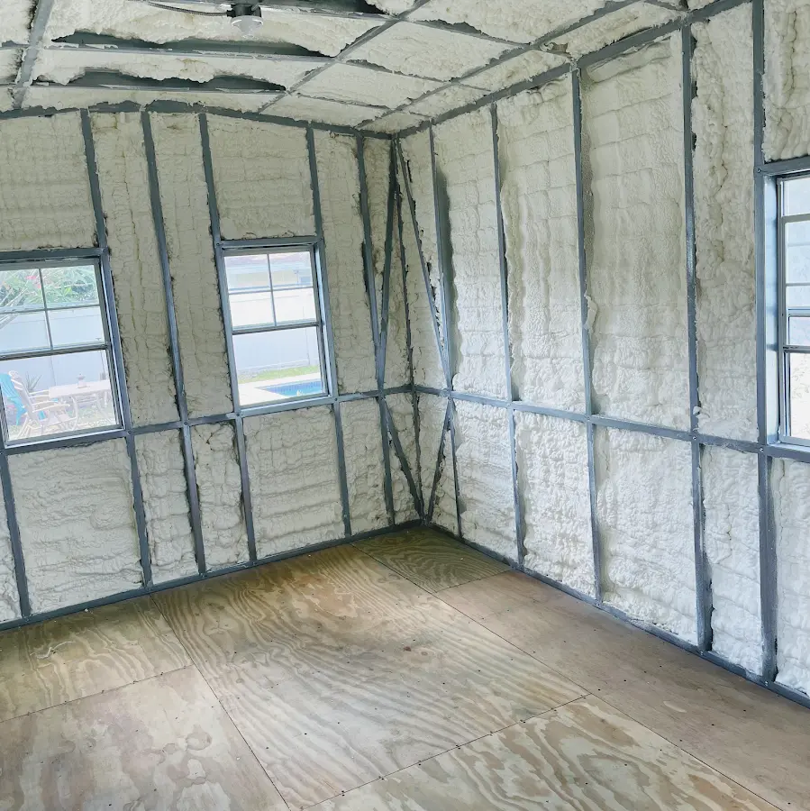 Closed-cell spray foam insulation applied to wall cavities in a residential project in Ogdensburg